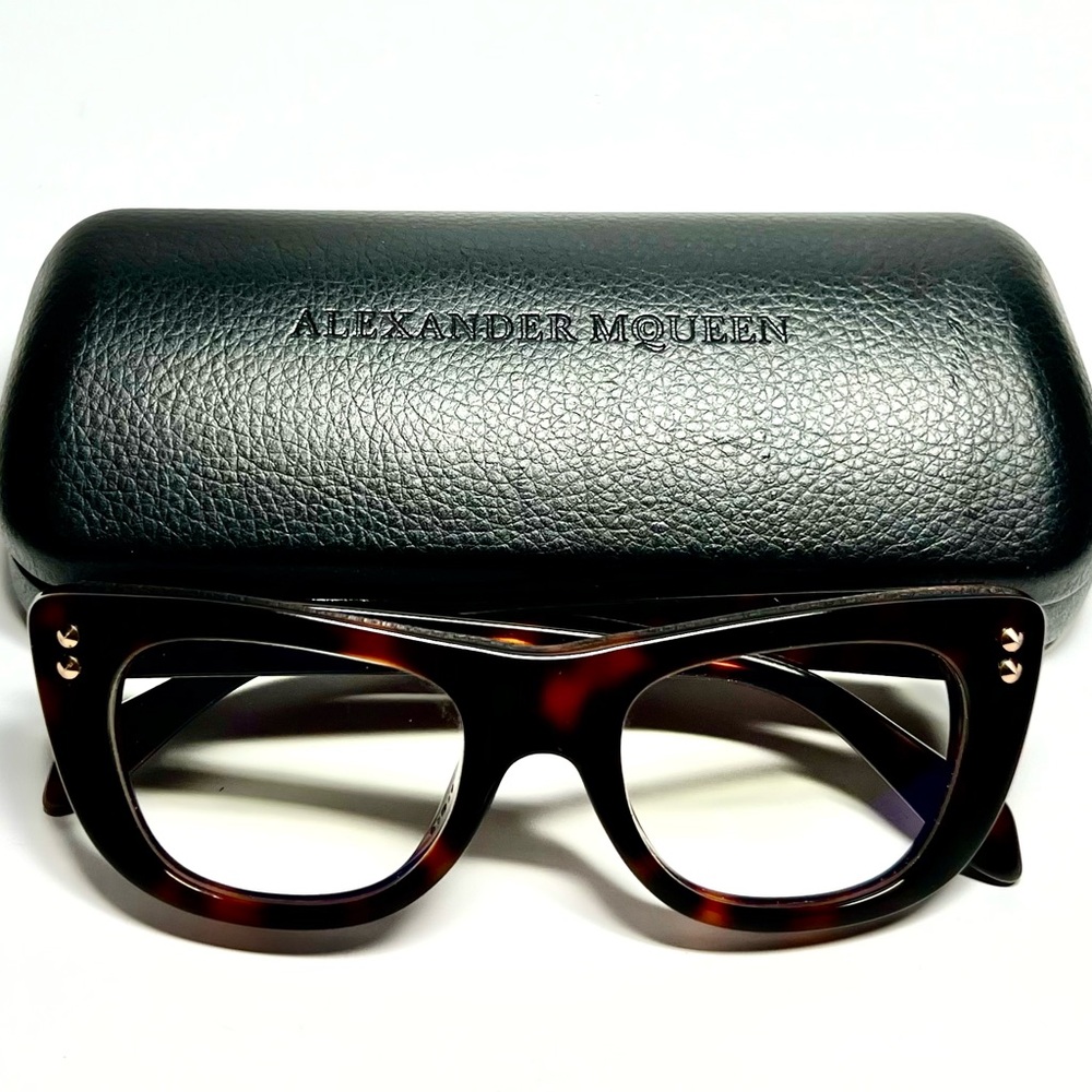 Alexander McQueen frame and case $110